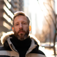 A man on NYC street, with face, professional 