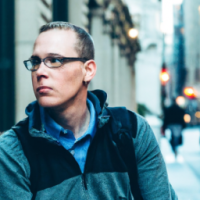 A man on NYC street, with face, professional, businessman 
